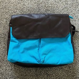 Cooperative canvas and leather backpack